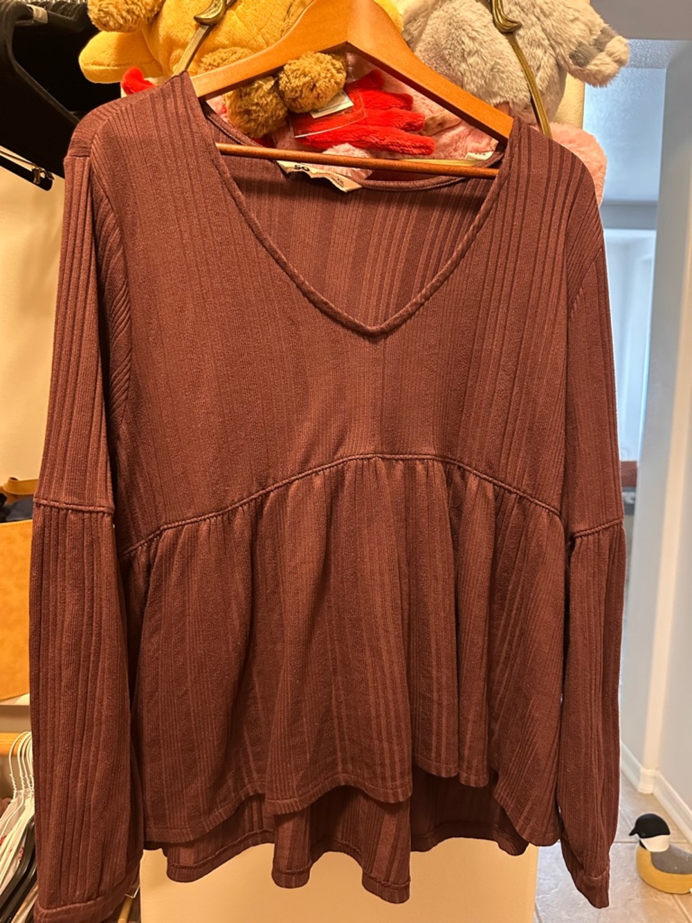 SO Ribbed V-Neck Long Sleeve Peplum Top in Brown